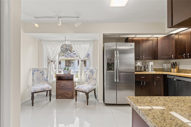 1007 Lake Avoca Dr, Tarpon Springs, FL 34689 - kitchen featuring tasteful backsplash, appliances with stainless steel finishes, dark brown cabinetry, and light stone counters