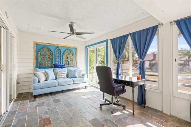 1007 Lake Avoca Dr, Tarpon Springs, FL 34689 - home office featuring ceiling fan and a textured ceiling