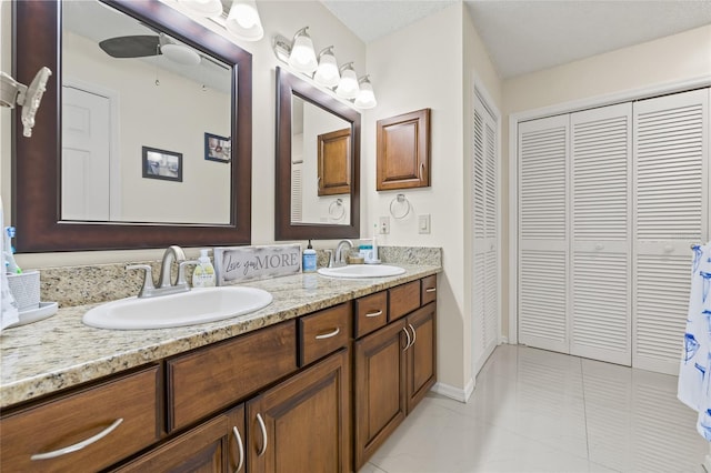 1007 Lake Avoca Dr, Tarpon Springs, FL 34689 - bathroom featuring ceiling fan and vanity