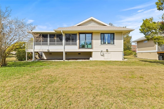 1007 Lake Avoca Dr, Tarpon Springs, FL 34689 - rear view of property featuring a yard and a sunroom