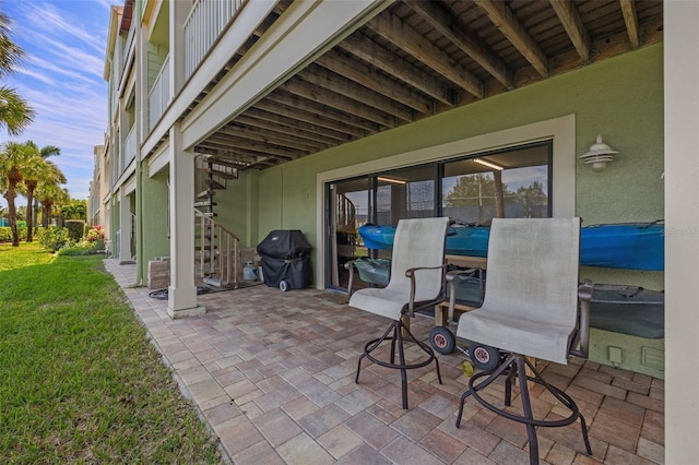 view of patio with a grill