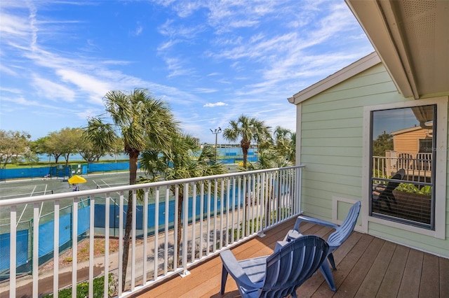 balcony featuring a water view