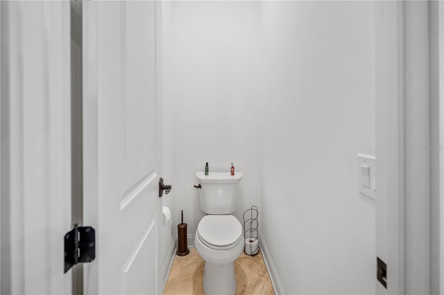 bathroom featuring toilet