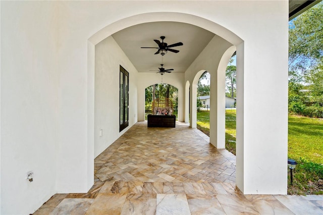 view of patio with ceiling fan