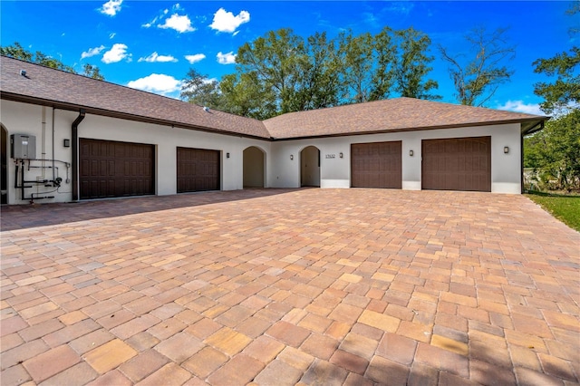 ranch-style home with a garage