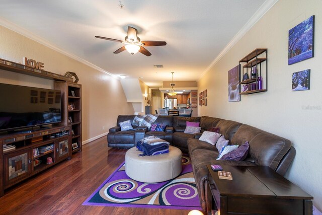 102 Brent Cir, Oldsmar, FL 34677 - living room featuring crown molding, ceiling fan, wood finished floors, and baseboards