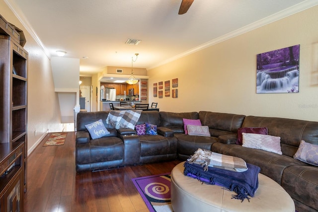 102 Brent Cir, Oldsmar, FL 34677 - living room featuring hardwood / wood-style flooring, crown molding, and a ceiling fan