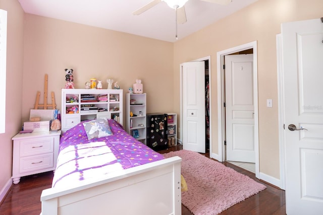 102 Brent Cir, Oldsmar, FL 34677 - bedroom featuring dark wood-style flooring, baseboards, and a ceiling fan