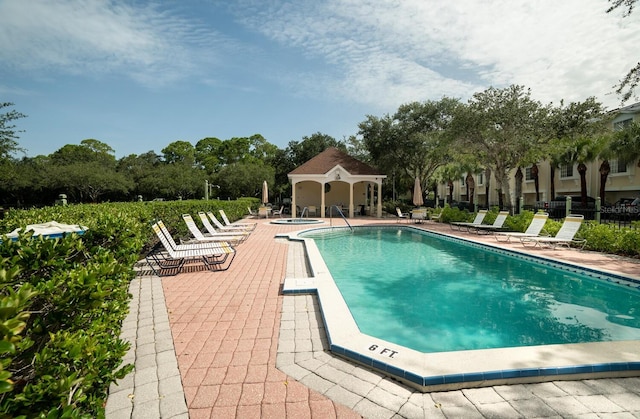 102 Brent Cir, Oldsmar, FL 34677 - community pool with a patio area
