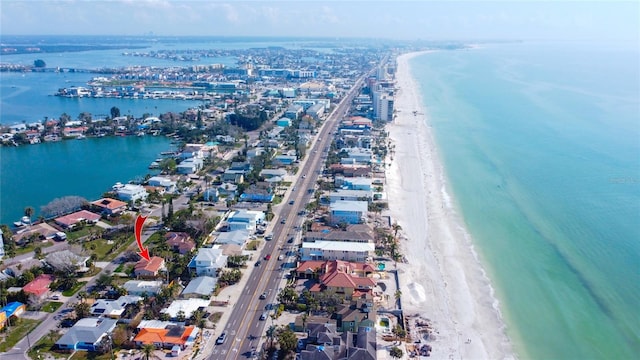 aerial view featuring a water view and a beach view