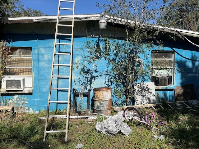 view of property exterior featuring cooling unit