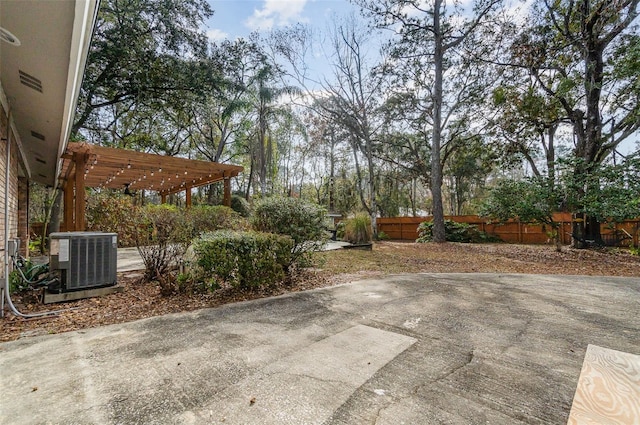 view of patio featuring cooling unit and a pergola