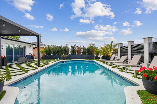 view of pool featuring a patio area