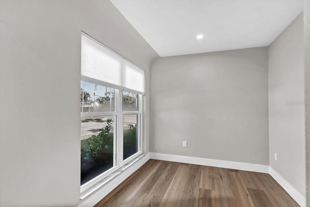 empty room featuring hardwood / wood-style flooring