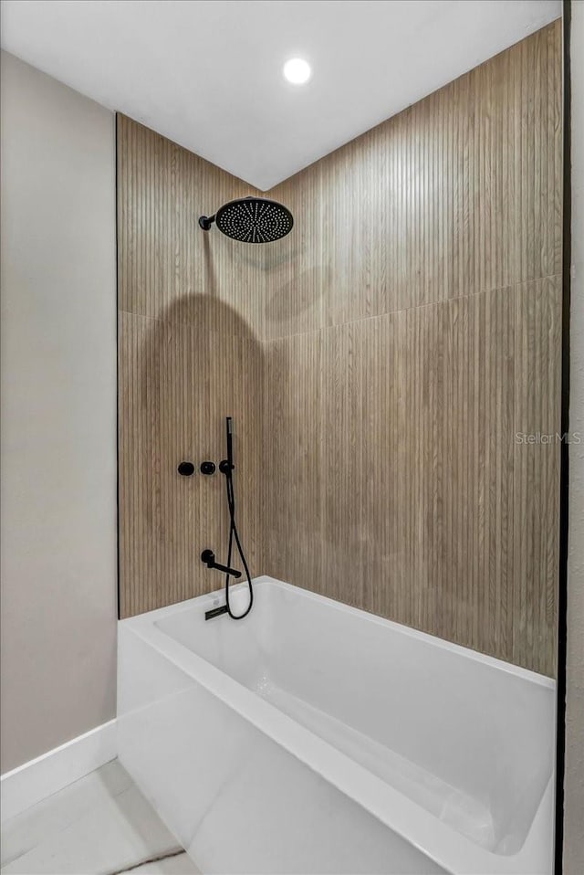 bathroom with shower / bathing tub combination