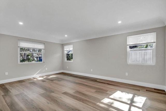 unfurnished room featuring light wood-type flooring