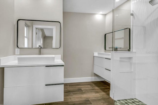 bathroom featuring hardwood / wood-style flooring and vanity