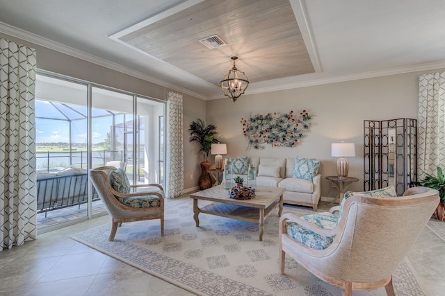 tiled living room with ornamental molding and a notable chandelier