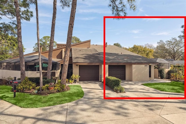 view of front of home featuring a garage