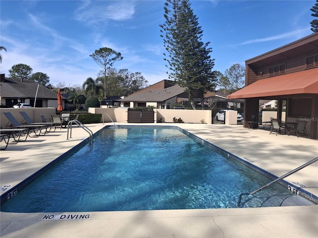 view of swimming pool featuring a patio