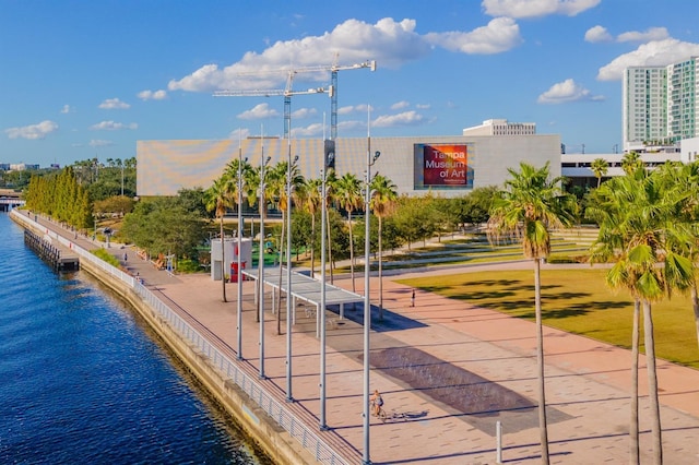 surrounding community with a water view