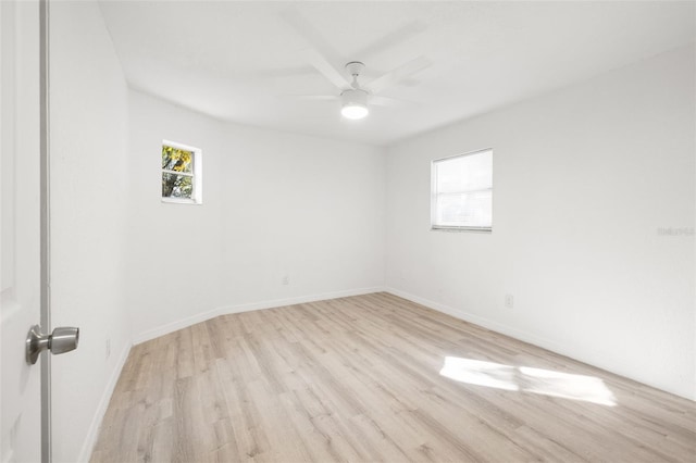 unfurnished room with ceiling fan and light hardwood / wood-style flooring