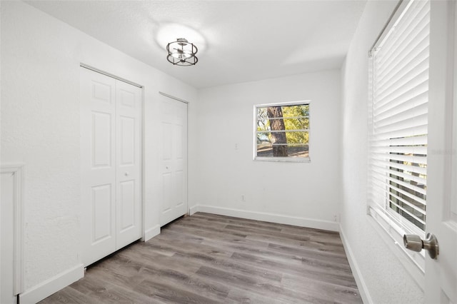 unfurnished bedroom featuring light hardwood / wood-style floors