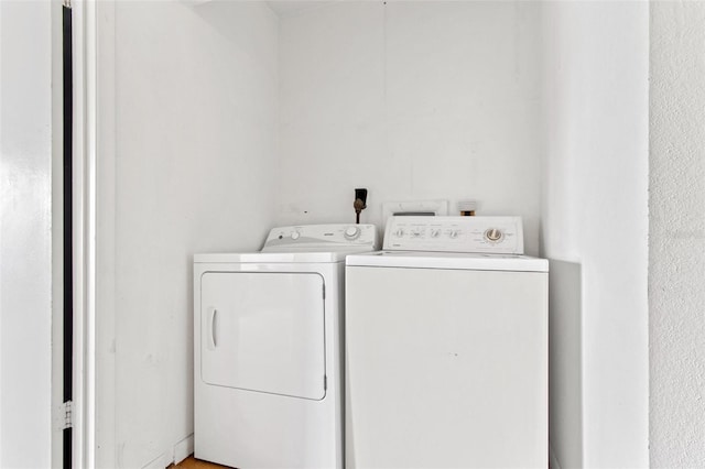 laundry area featuring washing machine and dryer