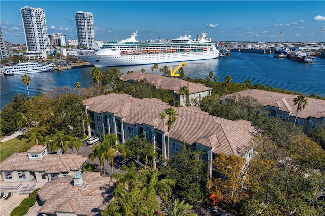 birds eye view of property featuring a water view