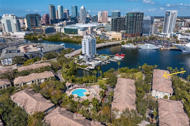 birds eye view of property with a water view