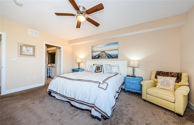 bedroom featuring ceiling fan, ensuite bathroom, and carpet flooring