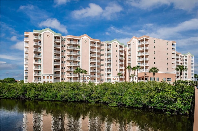 view of property with a water view