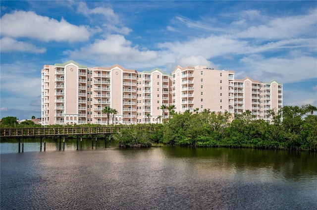 view of property with a water view