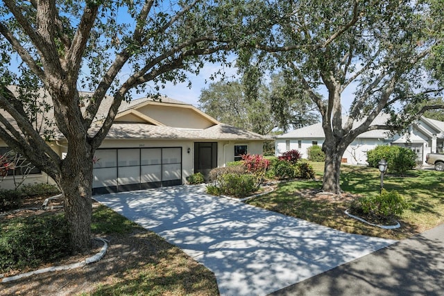 single story home with a garage