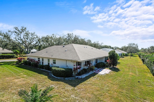 exterior space with a yard