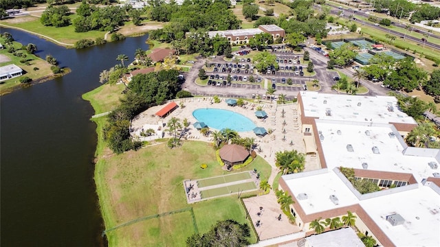 birds eye view of property with a water view