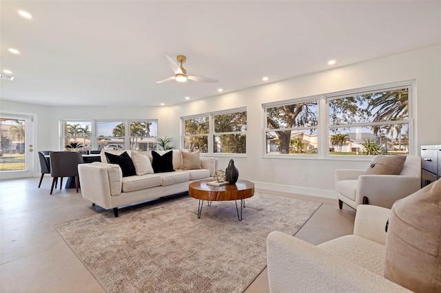 living room featuring ceiling fan