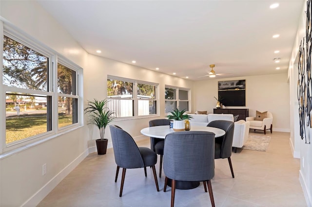 dining space with ceiling fan