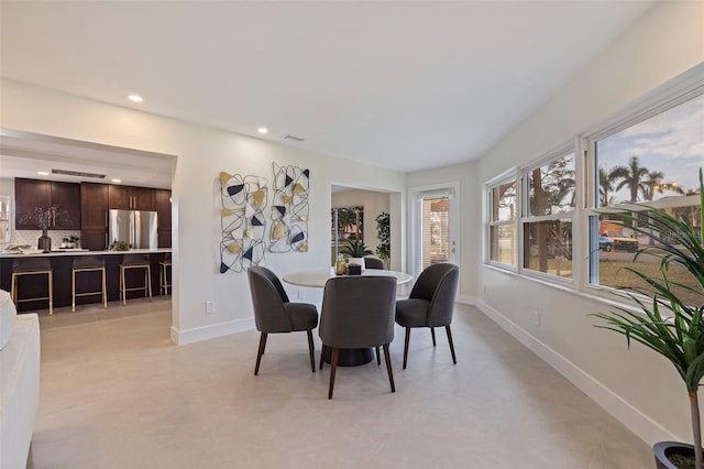 dining room with light tile patterned floors