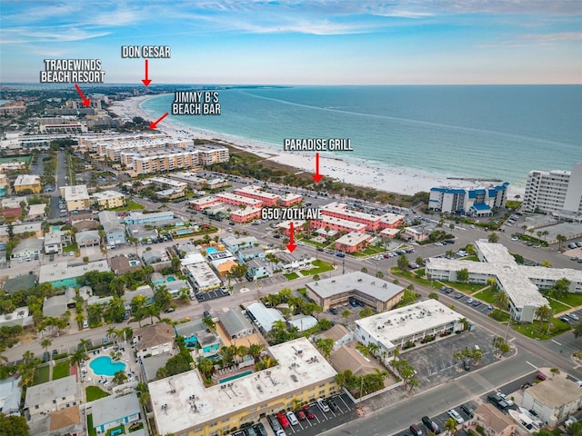 aerial view featuring a water view and a beach view