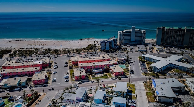 aerial view featuring a view of the beach and a water view