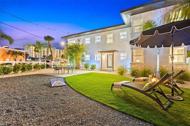 exterior space with a yard and a patio