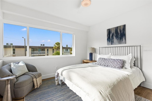 bedroom featuring dark hardwood / wood-style floors