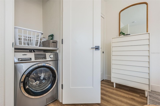 washroom with washer / clothes dryer and wood-type flooring