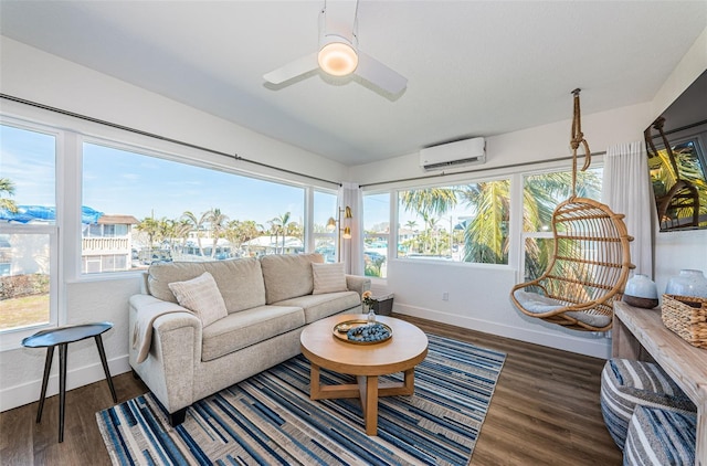 sunroom featuring ceiling fan and an AC wall unit