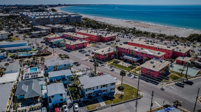 bird's eye view with a beach view and a water view