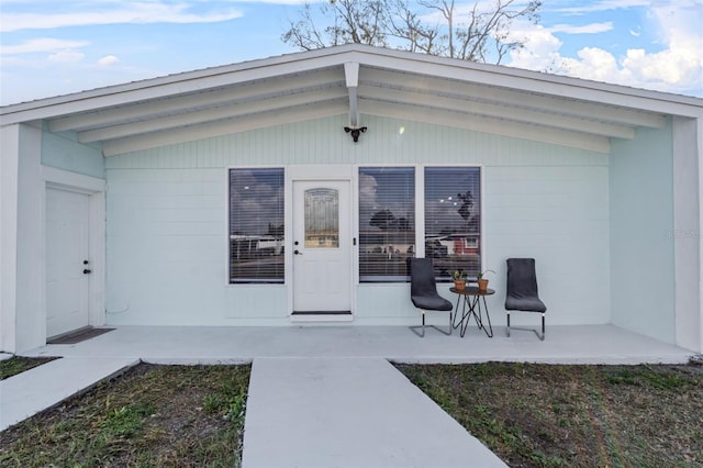 doorway to property featuring a patio