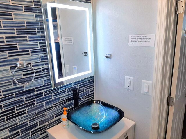 16333 Gulf Blvd Unit 105, Saint Petersburg, FL 33708 - bathroom with backsplash and vanity