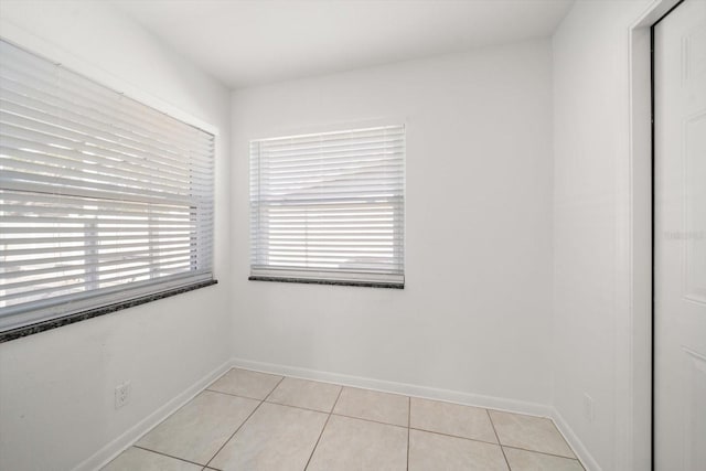 view of tiled spare room