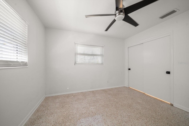 spare room featuring ceiling fan